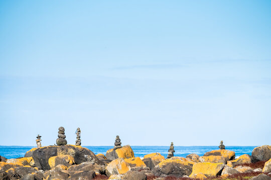 Rock stacks stand along on the coastline
