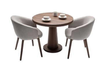 A cozy wooden table set with two armchairs and teacups