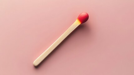 Single matchstick on pink background minimalist design element