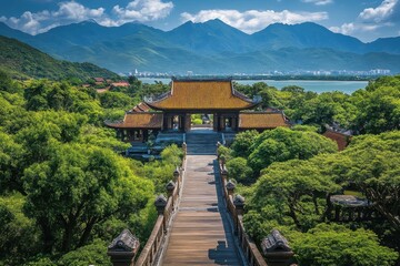 Scenic view of a traditional Asian temple gate and lush green foliage. Illustrates travel, architecture, spirituality, or Asian culture concepts.