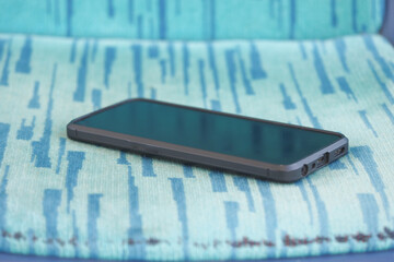 Smartphone lest of bus seat. lost smart phone concept 
