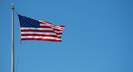 Obraz premium U.S. Flag Blowing in the Wind