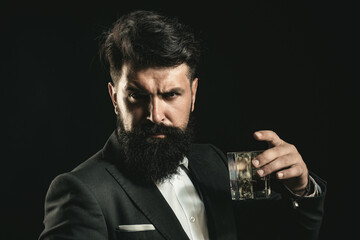 Brandy cognac scotch for liquor. Man drinking scotch alone at bar. Liquor classic vintage glass. Liquor glass held by man. Liquor store. Brandy scotch tasting with retro style.