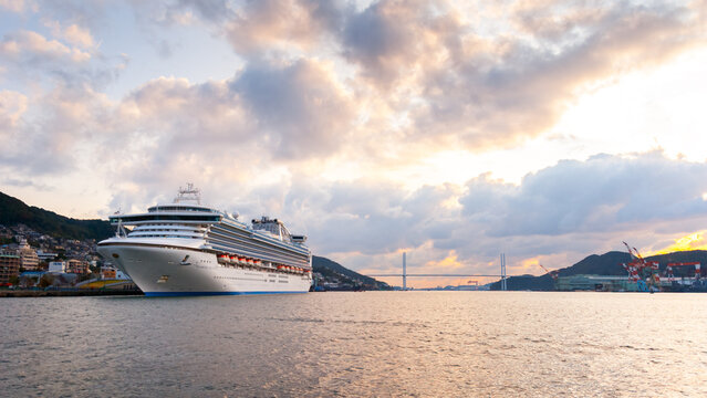 Nagasaki, Japan - November 16, 2010: Passenger cruise ship 'Diamond Princess' docked in the port of Nagasaki in Japan at sunset