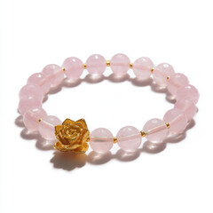 Delicate rose quartz bracelet featuring single gold flower charm, elegant and feminine