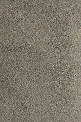 Close-up Wet Sand Texture on Iwama Beach, Iwaki City, Fukushima Prefecture, Japan – Natural Background for Travel, Tourism, Nature, Design, Copy Space and Relaxation Concepts

