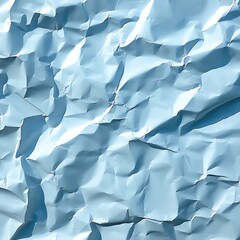 Fototapeta premium Crumpled light blue paper texture. Detailed close-up view of creased, uneven surface