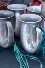 Antique metal cups