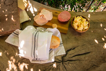 Loft of bread with meat and cheese on the side