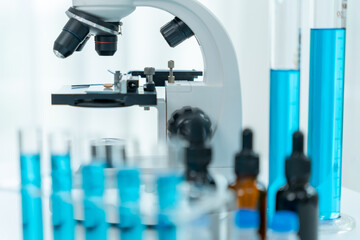 Scientist analyze biochemical samples in advanced scientific laboratory. Medical professional use microscope look microbiological developmental of viral. Biotechnology research in science lab.