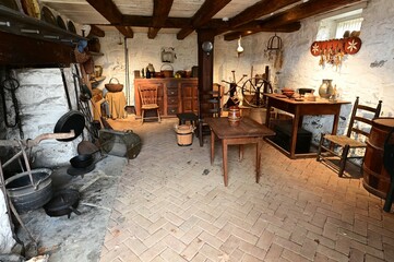 Showing how a kitchen used to be in America in the 18th century.