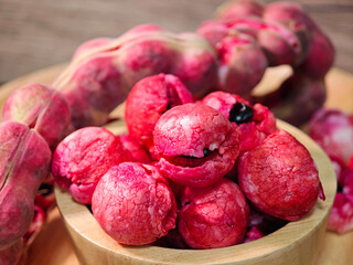 Manila tamarind in wooden cup