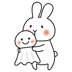 大きなてるてる坊主を持っている白いうさぎ