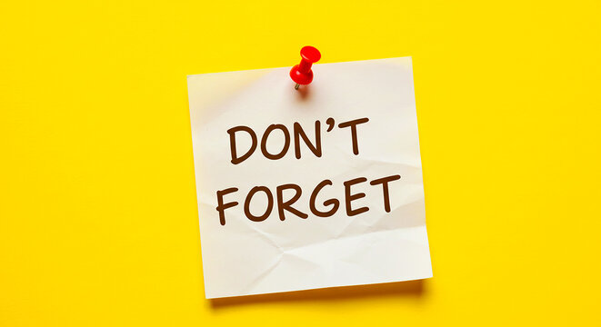A square sticky note with the words don't forget pinned to a bright yellow background with a red pin