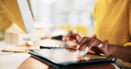 Hands, tablet and computer for creative, research or editing newsletter at office desk. Person,...