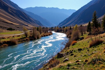 a clean river winding through a mountainous landscape, teeming with fish and wildlife.
