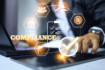 Compliance with businessman working on laptop to document submit regulation compiled requirement...
