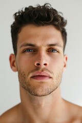 Obraz premium Close-up Portrait of Young Man with Blue Eyes