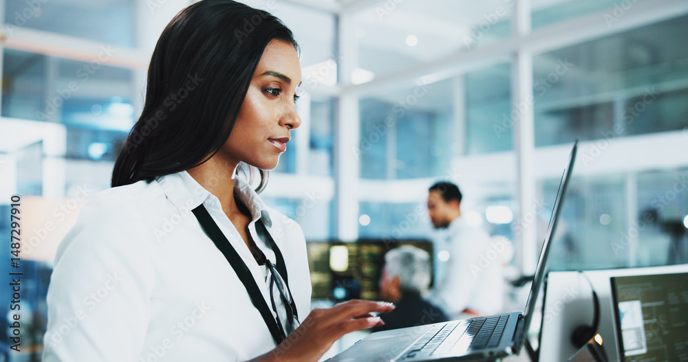 Poster Woman, developer and reading on laptop in office of programming, coding support and server update. Person, online app and IT for testing system, website application and troubleshooting at call centre