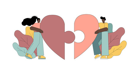 Man and woman collect a puzzle heart