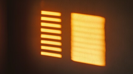 Soft sunlight illuminating a wall showing window blind shadows