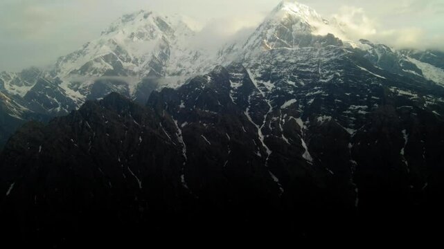 Aerial Tilt Up Scenic View Of Tranquil Snowcapped Mountains During Winter - Himalayas, Nepal