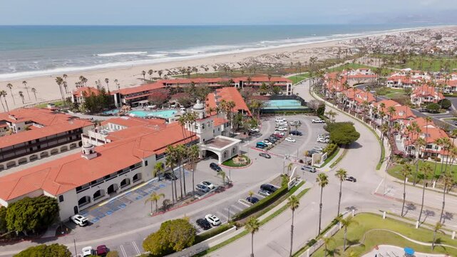 Aerial footage captures the charm of Oxnard, California, highlighting its stunning beachfront views, vibrant landscapes, and enchanting seaside architecture, showcasing the towns allure and beauty
