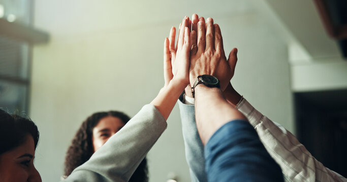 Business people, team building and high five for collaboration, motivation and success in office. Group, hands together and support with workers for corporate mission, goal or synergy for cooperation