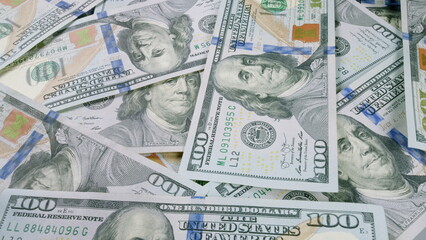 Stacks upon stacks of Money Numerous Hundred Dollar Bills Signifying Abundance and Wealth