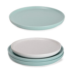 Empty round light green and beige plates on white background