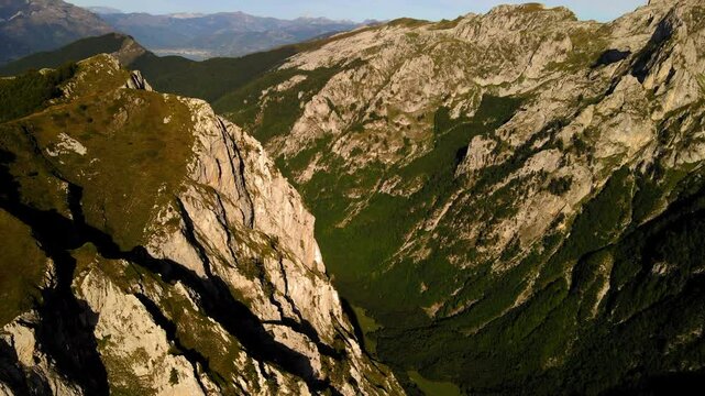 Aerial Forward Scenic Shot Of Tranquil Mountain Range Against Clear Sky - Plav, Montenegro
