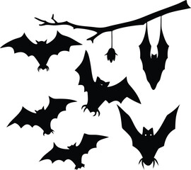 Fototapeta premium Silhouetted bats fly near tree branch with hanging bat, creating a Halloween scene