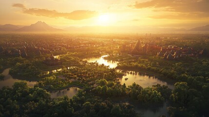 Fototapeta premium Aerial view of a lush green forest with a river at sunset.