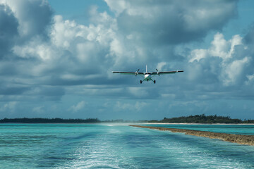 015-044-106-u8969375333_A_twin-propeller_plane_approaching_an_island_runw_7e8ef67d-feaf-4835-bc9d-3b5351537a9e_1