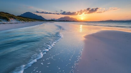 Fototapeta premium Serene Sunset Over a Sandy Beach with Gentle Waves