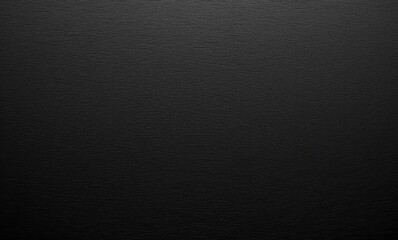 A sleek, textured black surface conveying elegance and simplicity.