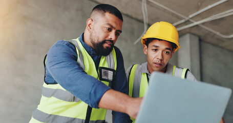 Man, laptop and architect at construction site with discussion, review and team for renovation...