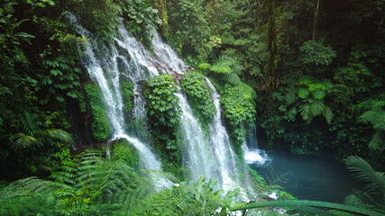 Fototapeta premium Panoramic View of Banyu Wana Amertha Waterfalls in Bali Tropical Forest
