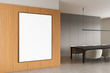 Contemporary interior with wooden wall and blank poster frame beside modern dining space with minimalist furniture and neutral tones. 3D Rendering