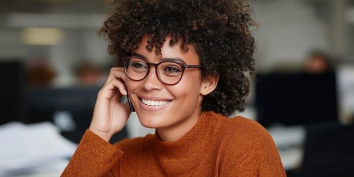 Professional recruiter conducting phone interview for candidate evaluation in modern office setting