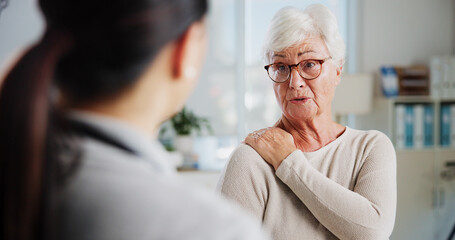 Physiotherapy, shoulder pain and medical with old woman and doctor for rehabilitation, osteoporosis...