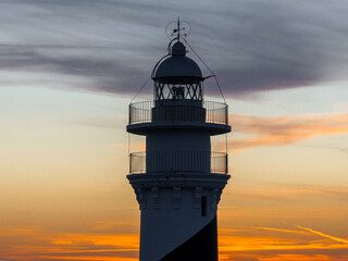 Faro de Favaritx al atardecer en la Isla de Menorca, Baleares