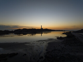 Faro de Favaritx al atardecer en la Isla de Menorca, Baleares