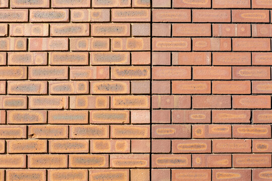 Fototapeta Brick wall with two different style bricks