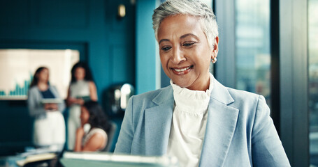 Smile, mature and businesswoman with tablet in office, news story and notification for blog post....