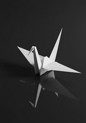 Origami crane on dark background