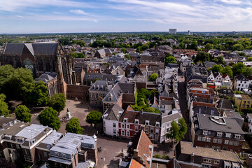 Obraz premium University and De Dom cathedral square in Utrecht, The Netherlands seen from above on a sunny day. Picturesque medieval city center