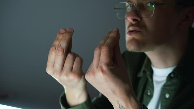 The man in the hands kisses the hands and shows the Italian belissimo gesture.
An enthusiastic man and a gesture with his hands.
Satisfied and happy Italian man shows belissimog gesture
