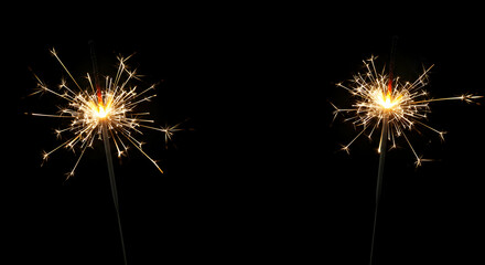 Fototapeta premium sparkler, sparklers, fireworks, Two Sparklers on Black Background
