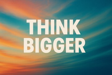 "Think Bigger" Text Against a Sky